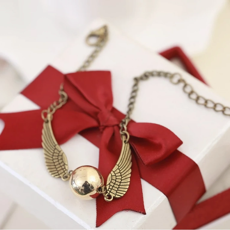 Bransoletka tematyczna z serii Harry Potter – model ze Snitch