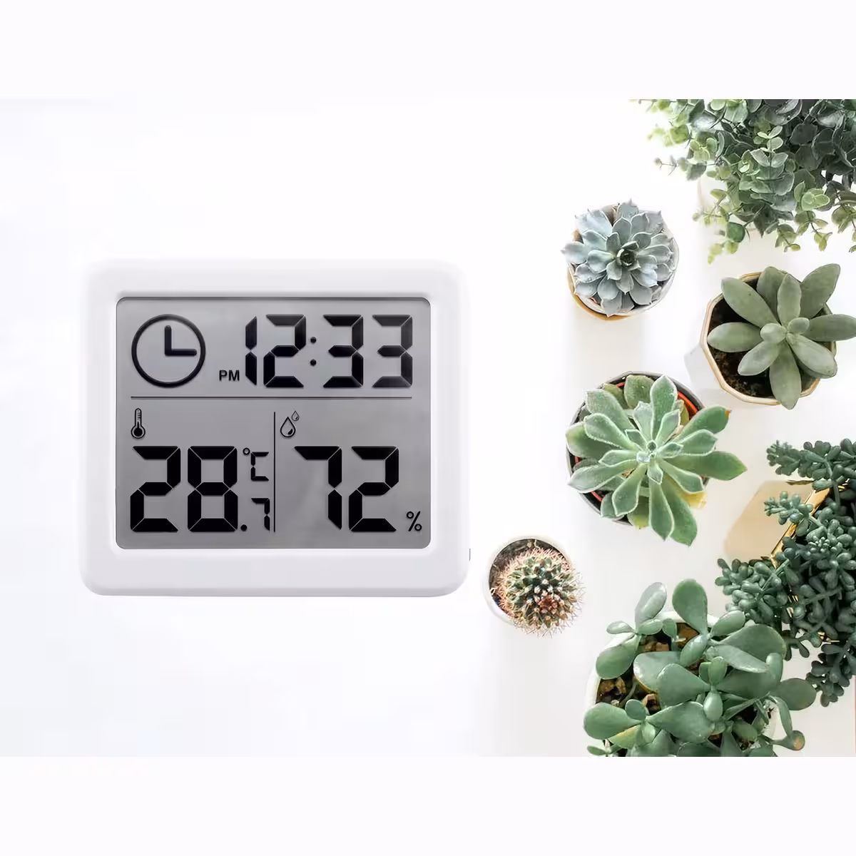 Przyrząd do pomiaru temperatury i wilgotności z cyfrowym zegarem i białą obudową