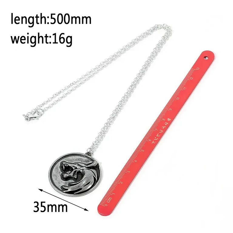 Zestaw prezentowy Wiedźmin: naszyjnik + brelok Zestaw prezentowy tematyka Wiedźmin, wisiorki głowa wilka, wysoka jakość