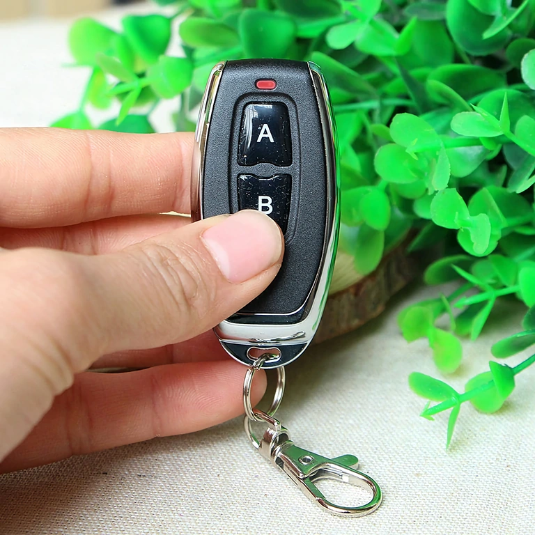 Kompaktowy model z 2 przyciskami, częstotliwość 433MHz, kod uczenia 1527